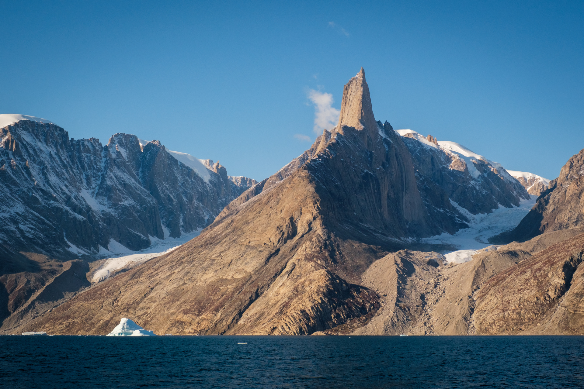 Towering granite wall of Øfjord.