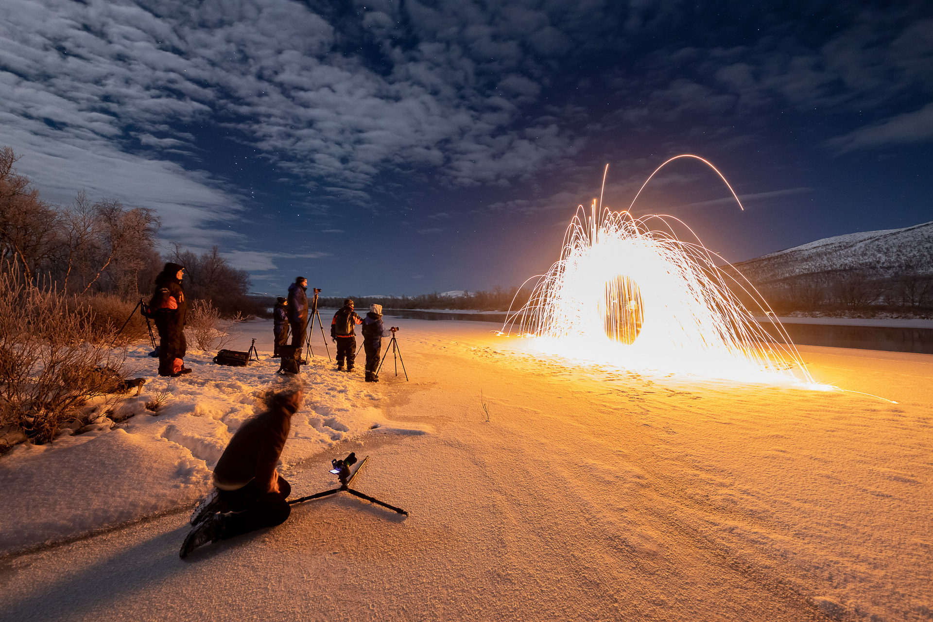 Fotogruppe mit glühender Stahlwolle.